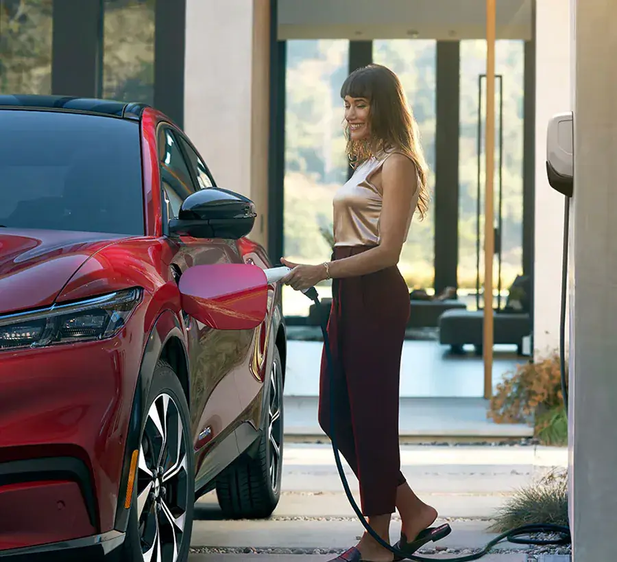 Electric vehicle charging at home in garage